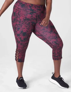 Crops And Capris^Lane Bryant Livi High-Rise Livi Soft Capri Legging - Strappy Hem Lagos Tropical Print