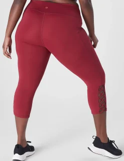 Crops And Capris^Lane Bryant Livi High-Rise Livi Soft Capri Legging - Strappy Hem Rumba Red